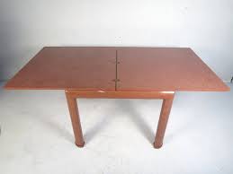 Applebee's makes the perfect casual date night. Vintage Expanding Dining Table For Sale At 1stdibs