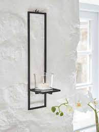 Large round silver lear with holder for a large pillar candle. Wall Mounted Tealight Holder Wall Tealight Holder Wall Mounted Candle Holders Wall Candle Holders Indoor Candle Lanterns