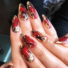 Matte Black Red And Gold Nails Nail And Manicure Trends These red and gold nails are far from your average christmas nails.