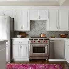 Comb through 25 of the best kitchen runner rugs that are desingers' favorites and are a great addition to any kitchen. Orange And Hot Pink Kitchen Rug Design Ideas
