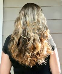 A messy bun is the ideal bun style that won't stretch your hair to the point of disturbing your curls. Easy Heatless Sock Bun Curls And Wavy Hair The Frugal Girls
