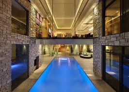 Indoor swimming pools, while still considered a pretty fancy feature in the home, are truly gaining popularity in mainstream america. Indoor Swimming Pools Some Of The Best Photos For Indoor Swimming Pool