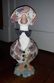 New here and just love the creativity of this group! I inherited my goose when I purchased my home. She came with a patriotic outfit and I DIY'ed several of my own