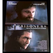 Prisoners is a mysterious puzzle in which the pieces do not fit together until the very end. Prisoners Movie Poster