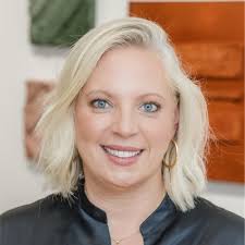 I sent my mom this picture of me introducing President Daniels at our  25-year reunion The Johns Hopkins University and she commented