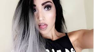 The base black shade that transitions to silver is an example of such a tone, and it forms an incredible contrast that makes the long textured swirls look very elegant. Black And Silver Wig Www Macj Com Br