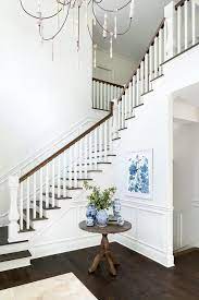 Stair, railing, guardrail, handrail, landing & platform building design & build specifications: Round Table In Staircase Corner Cottage Entrance Foyer
