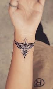 It is a visual representation and purposeful communication. Andel Choosing The Design Nufactured Nations United Tattoo Is Not Always Easy Mautes And Whi Wrist Tattoos For Women Tattoos For Women Phoenix Tattoo Feminine