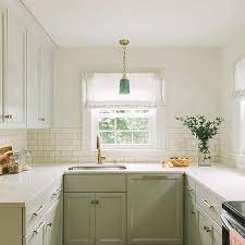The window sills are all made to. Pale Green Shaker Kitchen Cabinets Design Ideas