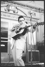Part rockabilly rebel, part campfire storyteller, part outlaw in black, his hearty baritone has remained the essence of country music. Young Johnny Cash Wallpaper Posted By Christopher Sellers