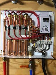 Compact Design Of The Water Heating System Saves Up To 12 Cubic Metre Of Storage Space When Compared Water Heating Systems Tankless Water Heater Water Heating
