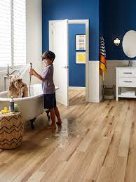 Use a dust mop or vacuum to remove loose dirt and debris. Smartcore Flooring