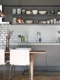 Dark cabinets, sleek concrete flooring, and light wood furniture. Scandinavian Kitchen Design Scandinavian Kitchen Design Modern Kitchen Home Kitchens