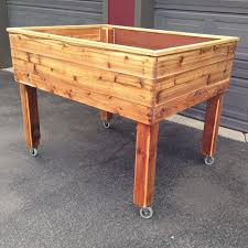 Raised Garden Bed With Wheels My Husband Made This For Me To Put On The Deck So The Deer Don T Eat The Veg Cedar Raised Garden Beds Raised Garden Garden Beds