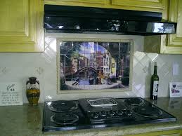 Beautiful italian tile backsplash mural of a kitchen window featuring a still life of olive tiles, grapes, bread, cheese, garlic, olive oil, olives, rosemary, lemons and a hummingbird by american artist linda paul. 3 Kitchen Backsplash Ideas Pictures Of Kitchen Backsplash Installed Tile Murals Thetilemuralstore S Blog