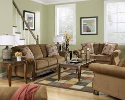 Montgomery Mocha Queen Sofa Sleeper With Flared Arms Exposed Faux Wood By Signature Design By Ashley Mocha Living Room Cheap Living Room Sets Living Room Sets