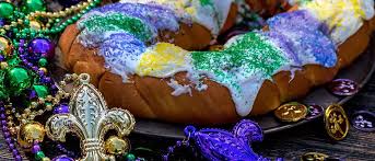 De zulu king cake heeft chocoladesuikerglazuur met een kokosvulling. King Cakes Bakery Gambino Atwood Aunt Sally