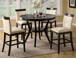 Enjoy a morning cup of coffee or drinks and dinner in the evening on a counter high dining set that sits higher than conventional tables. Dark Wood Round Counter Height Kitchen Table And 4 Chirs Counter Height Dining Set Kitchen Table Settings Kitchen Table Small Space Pub Height Table