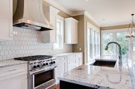 Yes, these can be installed over existing tiles. White Honeycomb Tile Backsplash Design Ideas