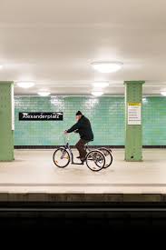 Casually Strolling On A Tricycle In Alexanderplatz U Bahn Station Berlin Ubahn Photography Berlin Photography Berlin Photos Berlin City