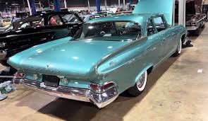Image result for Turquoise 1961 Dart