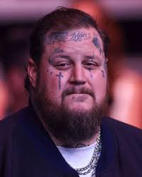 Hi! I'm new to this group. I recently joined because Jelly Roll has such a  kind and generous heart. He is relatable, how can you not like him?