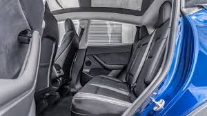 Fitur eksterior termasuk adjustable headlights, fog lights front, power adjustable exterior rear view mirror, alloy. Tesla Model Y Interior Review
