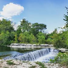 🤩 Round Rock has some GORGEOUS views! Explore the Chisholm Trail Crossing  Park and take in the beauty of its waterfall. 🌿 Perfect for a day of  outdoor exploring! 📸: @cariito22 #GoRoundRock