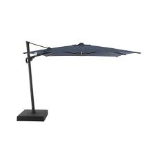 The frame's crank opens and closes the umbrella. Modern Muse 10 Ft Spectrum Indigo Offset Patio Umbrella Crank Mm Ya0110l Si Rona