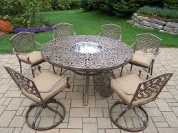 This set includes the sofa with canopy, 2 chairs and center ottoman, all with cushions and pillows as shown. Patio Store Mississippi Aluminum 8 Pc Dining Set With 60 Inch Round Interchangeable Table 4 Cushioned Stackable Cast Aluminum Arm Chairs 2 Cushioned Swivel Rockers And Stainless Steel Ice Bucket Antique Bronze