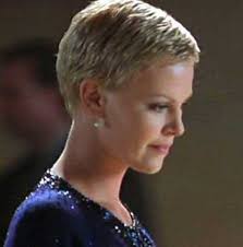 The hair around her neck and ears is tapered crisply. 20 Charlize Theron Pixie Cuts Pixie Cut Haircut For 2019