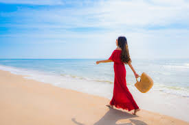 On the beach more strongly suggests you were actually on the sand that adjoins the water. Free Photo Portrait Beautiful Young Asian Woman On The Beach And Sea