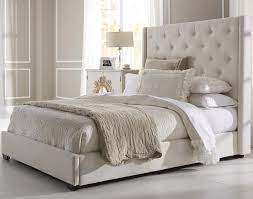 It includes two nightstands and one bed, all made from a blend of solid and engineered wood in a neutral hue. Fabric Headboard Bedroom Sets Ivory Leather Cover Platform With King Upholstered Bed Queen Upholstered Bed Upholstered Beds