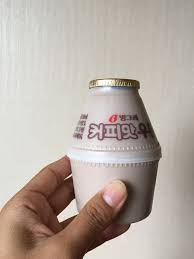 맛 in korean translates as taste (or flavor) which makes sense as this is simply a banana flavored milk drink. Coffee Milk