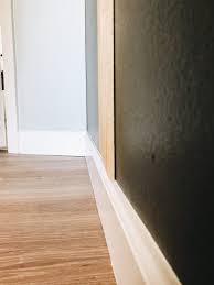 A wood slat wall is a feature or accent wall made using wood boards that are spaced equally apart on a wall. Diy Wood Slat Wall Within The Grove
