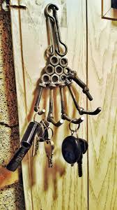 Welded Screws And Nuts Skeleton Hand Keys Hanger Hand Crafted Mma Welded Metal Art Welded Welding Art Metal Art Projects