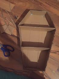 Fold each stack in half. Garbage Heap I Present To You My Cardboard Coffin Shelf Now Halloween Coffin Halloween Party Diy Diy Cardboard