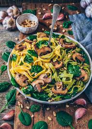 Pasta With Mushrooms Spinach Garlic And Pine Nuts Vegan Mushroom Pasta Mushroom Pasta Spinach Pasta