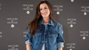 Anne Hathaway’s Moncler Shirt Hanging by a Button Leaves Little Covered