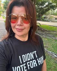 I like the one Joan Baez wears too. “Is He Dead Yet”