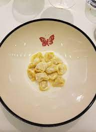 As i ate massimo bottura's tortellini at his osteria francescana in modena, italy, i wondered how so much history, so many layers of flavor, so much research could be packed into such dumplings so tiny. Tortellini Con Carne E Parmigiano Picture Of Gucci Osteria Da Massimo Bottura Florence Tripadvisor