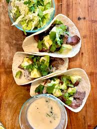 When the oil is hot, add the chopped onion and sauté for about 2 minutes. The Best Ribeye Steak Tacos With White Queso The Carolina Table