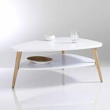 Peu encombrante, parfois présentée en version table basse ronde double plateau, cette table de salon sera idéale pour disposer d'une zone rangement et d'une zone pour. Table Basse Scandinave 38 Modeles D Inspiration Nordique 2019