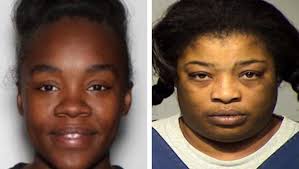 Mother, girlfriend of escaped murder defendant charged