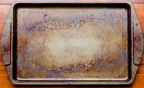 4 Ways To Make Old Crusty Pans Shine Like New Again Clean Baking Pans Clean Cookie Sheets Cleaning Hacks