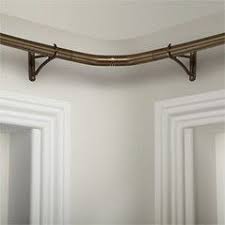 John Lewis Brass Toned Flexible Bay Bend Corner Window Curtains Corner Window Treatments Stone Wall Interior Design