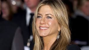 Jennifer Aniston's silver mini dress and chic blazer was a masterclass in  glam