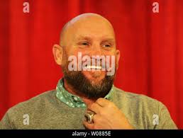 New St. Louis Cardinals first baseman Paul Goldschmidt readies himself for  the pitch against the San Diego Padres in the first inning at Busch Stadium  in St. Louis