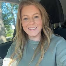 What plants are suitable for a small pond in a whiskey barrel planter?