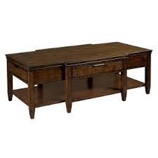 Made of reclaimed fir wood, it provides handsome style along with a place to perch remotes, magazines and snack trays on. Kincaid Coffee Tables Glass Wood Afa Stores